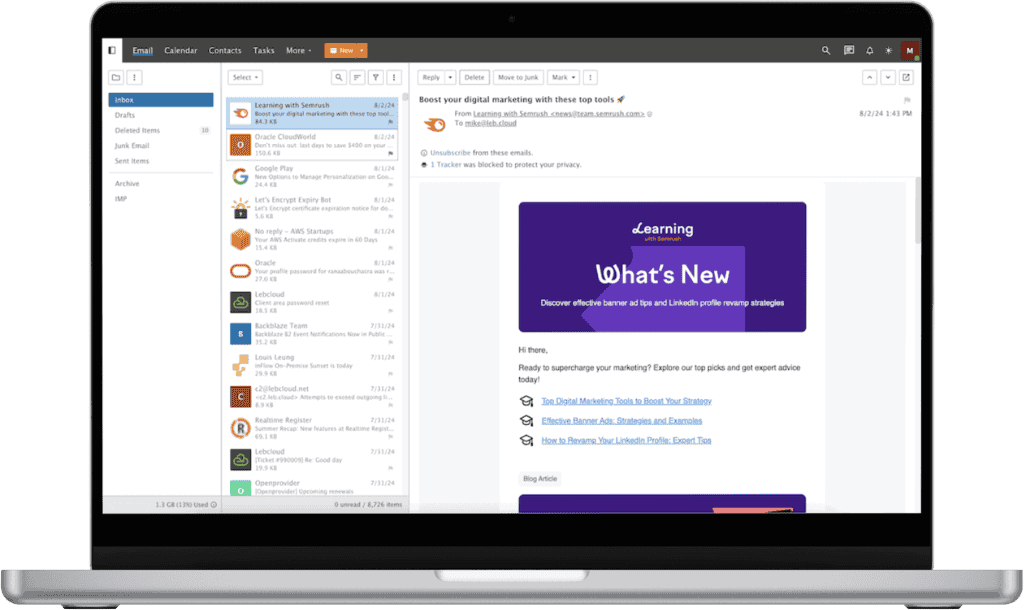 Business email inbox displayed on a laptop